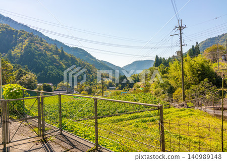 The scenery of Mt. Mizuken and the lush green countryside in Hyogo Prefecture The scenery of Mt. Mizuken and the lush green countryside in Hyogo Prefecture 140989148