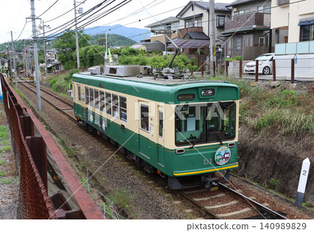 Keifuku Electric Railway's Type 611 running near Omuro-Ninnaji Station. Keifuku Electric Railway's Type 611 running near Omuro-Ninnaji Station. 140989829