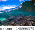 Beautiful coral reefs, sky, and waves 140990375