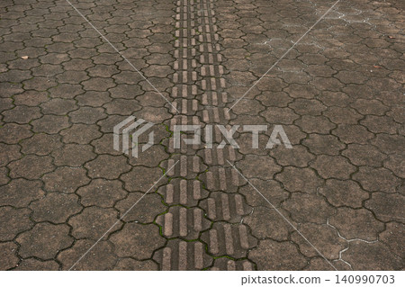 Braille blocks installed on the walking path Braille blocks installed on the walking path 140990703