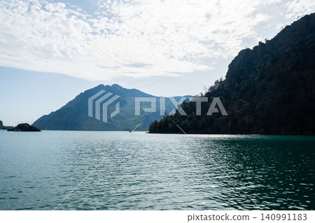 Panoramic Landscape view on green canyon Antalya Turkey with turquoise water mountain cliffs and green forest. Showcasing natural beauty travel tourist destination. Vacation concept 140991183
