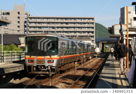 Kiha 127 train stopped at Harima-Takaoka Station on the Himeji-Shinjuku Line. Kiha 127 train stopped at Harima-Takaoka Station on the Himeji-Shinjuku Line. 140991353