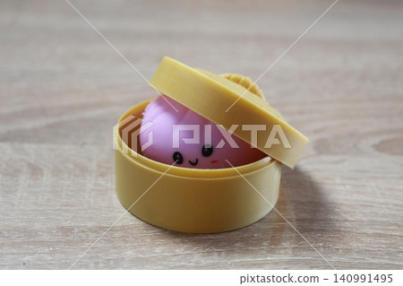 Pink Anti-Stress Squash squishy Dumpling Lying In Yellow Case Pink Anti-Stress Squash squishy Dumpling Lying In Yellow Case 140991495