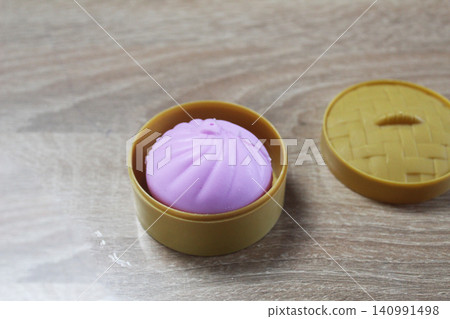 Anti-stress toy in a box on a table top view Anti-stress toy in a box on a table top view 140991498