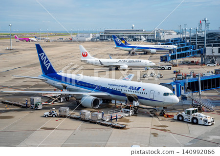 View from the "Sky Deck" at Chubu Centrair International Airport: Domestic passenger planes parked on the apron. View from the "Sky Deck" at Chubu Centrair International Airport: Domestic passenger planes parked on the apron. 140992066
