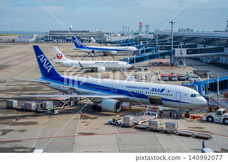 View from the "Sky Deck" at Chubu Centrair International Airport: Domestic passenger planes parked on the apron. View from the "Sky Deck" at Chubu Centrair International Airport: Domestic passenger planes parked on the apron. 140992077
