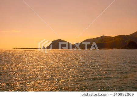A sunset view of the Amakusa Islands, Amakusa West Coast (Sakitsu - Oe) A sunset view of the Amakusa Islands, Amakusa West Coast (Sakitsu - Oe) 140992809