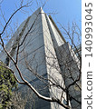 Bare trees and modern buildings 140993045
