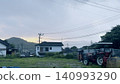 A tractor at dusk in rural Japan 140993290