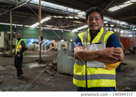 Workers Factory or Engineering work at factory site check up machine or products in site. 140994337