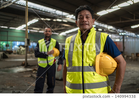 Workers Factory or Engineering work at factory site check up machine or products in site. 140994338