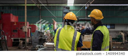 Workers Factory or Engineering work at factory site check up machine or products in site. Workers Factory or Engineering work at factory site check up machine or products in site. 140994340