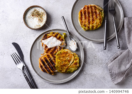 Grilled o cabbage steaks, vegan food Grilled o cabbage steaks, vegan food 140994746