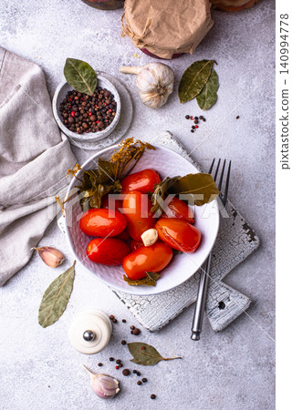 Marinated pickled tomatoes in jar Marinated pickled tomatoes in jar 140994778