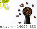 arabica coffee beans roasted medium caffeine drinks on spoon with flowers jamine 140994833