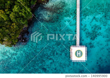 Aerial view of helipad over the sea Aerial view of helipad over the sea 140995900
