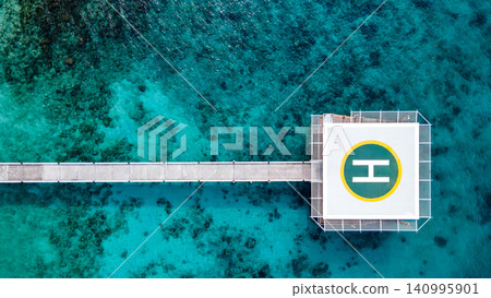 Aerial view of helipad over the sea Aerial view of helipad over the sea 140995901