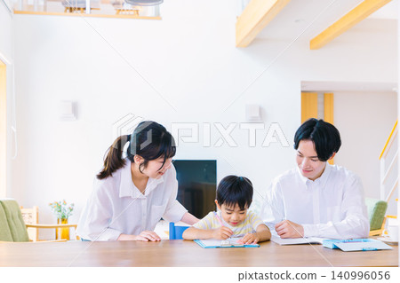 Parents watching over their children while they study Parents watching over their children while they study 140996056