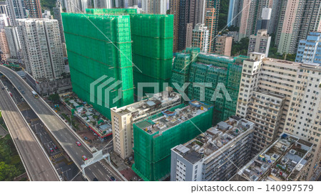 July 1 2026. Hong Kong Urban Renewal and Scaffolding Netting July 1 2026. Hong Kong Urban Renewal and Scaffolding Netting 140997579