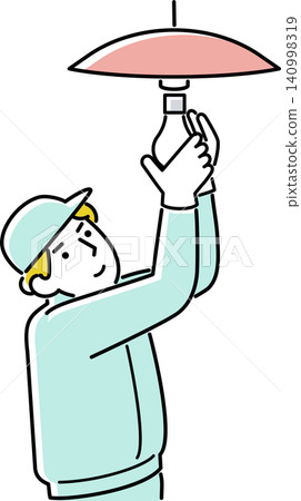 A man changing a light bulb A man changing a light bulb 140998319