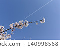 Spring sky and contrails 140998568