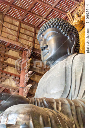 Buddha statue with a sense of history Buddha statue with a sense of history 140998644