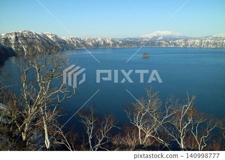 A breathtaking winter spectacle: the grand panorama of Lake Mashu in Hokkaido. A breathtaking winter spectacle: the grand panorama of Lake Mashu in Hokkaido. 140998777