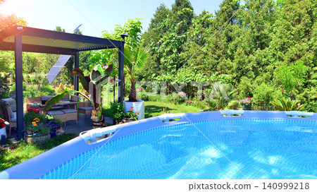 Outdoor swimming pool in a garden with lawn, plants and trees. Outdoor swimming pool in a garden with lawn, plants and trees. 140999218