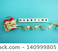 Overtime spelled out with urgency and time pressure 140999805