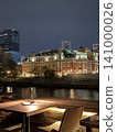 The light reflecting on the water's surface at night in Nakanoshima Park 141000026