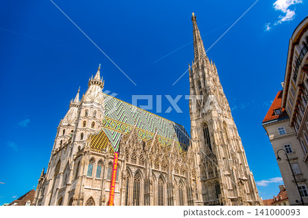 Austria, Vienna: St. Stephen's Cathedral, a Gothic architectural masterpiece, stands out against the blue sky. Austria, Vienna: St. Stephen's Cathedral, a Gothic architectural masterpiece, stands out against the blue sky. 141000093