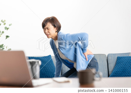 Female low back pain Female low back pain 141000155