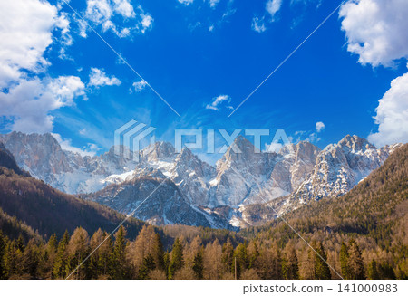 The tops of the mountains are covered with snow. Triglav national park. Slovenia, Europe The tops of the mountains are covered with snow. Triglav national park. Slovenia, Europe 141000983