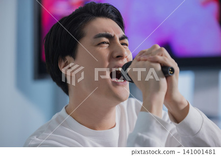A man sang at a karaoke A man sang at a karaoke 141001481