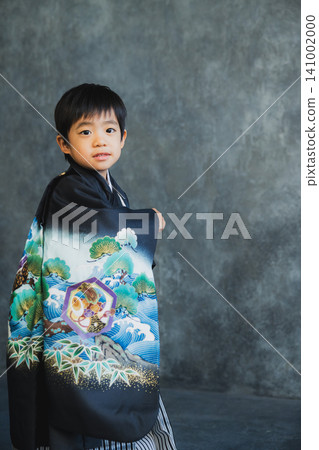 A boy in a hakama A boy in a hakama 141002000