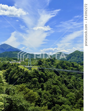 The Kokonoe Yume Suspension Bridge, the tallest pedestrian suspension bridge in Japan, spans the Narukogawa Gorge in Kokonoe Town, Oita Prefecture. The Kokonoe Yume Suspension Bridge, the tallest pedestrian suspension bridge in Japan, spans the Narukogawa Gorge in Kokonoe Town, Oita Prefecture. 141002272