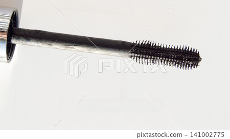 Close-up of a black mascara brush isolated on a white background 141002775