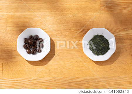 Coffee beans and tea leaves Coffee beans and tea leaves 141002843