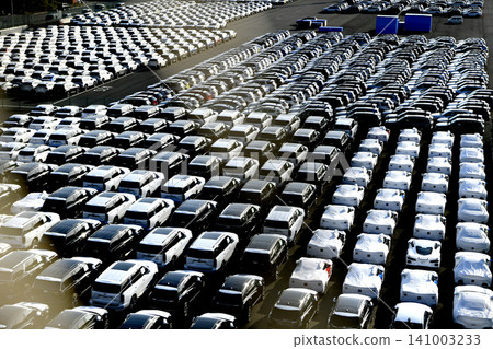 The urban landscape of Yokohama, Japan: A blend of Japanese and American wisdom and the global economy… Views of cars lined up at Daikoku Pier. Towards tomorrow. 141003233