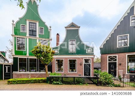 Traditional Dutch houses in Zaanse Schans, near Amsterdam, Netherlands. Traditional Dutch houses in Zaanse Schans, near Amsterdam, Netherlands. 141003686