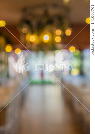 Vintage tone blur image of food stall at night festival with bokeh for background usage. Vintage tone blur image of food stall at night festival with bokeh for background usage. 141003701