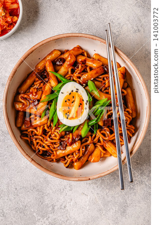 Rapokki - tteokbokki with noodles and chajang sauce Rapokki - tteokbokki with noodles and chajang sauce 141003772
