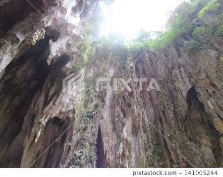 A view looking up at the karst topography of the Batu Caves. A view looking up at the karst topography of the Batu Caves. 141005244