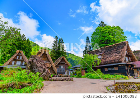 A clear early summer day, and a nationally designated historical monument and a traditional gassho-zukuri house stand in the Ainokura Gassho-zukuri village of Gokayama. A clear early summer day, and a nationally designated historical monument and a traditional gassho-zukuri house stand in the Ainokura Gassho-zukuri village of Gokayama. 141006088