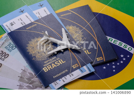 Brazil, Brazilian passport or id document with tickets for flight, travel. Brazilian passport Brazil, Brazilian passport or id document with tickets for flight, travel. Brazilian passport 141006890