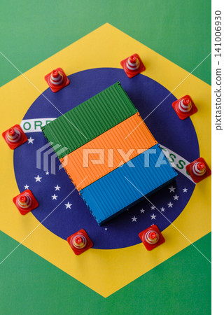 The cargo container ban on the brazil flag as a conceptual backdrop. Cargo container embargo The cargo container ban on the brazil flag as a conceptual backdrop. Cargo container embargo 141006930