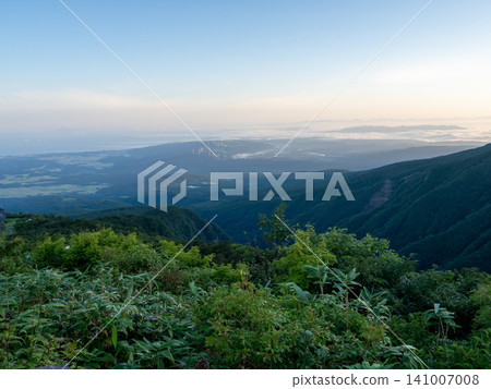 A plateau peak covered in a green carpet A plateau peak covered in a green carpet 141007008