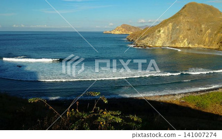 A beautiful view of the blue sea and hills in Lombok, Indonesia. 141007274