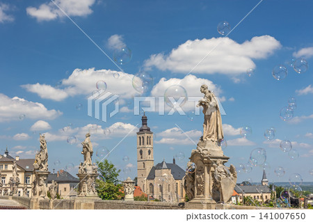 Town of Kutna Hora. Soap bubbles are flying in the foreground. Town of Kutna Hora. Soap bubbles are flying in the foreground. 141007650