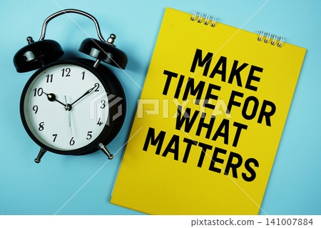 Make Time For What Matters text with alarm clock on blue background Make Time For What Matters text with alarm clock on blue background 141007884